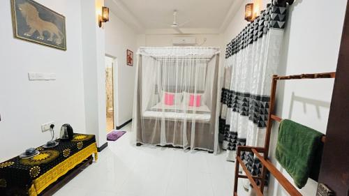 Postel nebo postele na pokoji v ubytování Jilan Homestay
