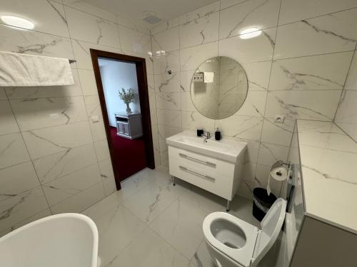 Koupelna v ubytování Hotel Sebastian u Hoffera