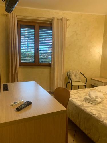 Ein Bett oder Betten in einem Zimmer der Unterkunft Scilla e Cariddi