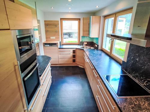 Η κουζίνα ή μικρή κουζίνα στο Apartment Bella Monte-5 by Interhome