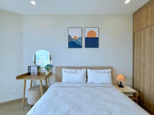 Кровать или кровати в номере MeoMeo Homestay - The Sóng Apartment