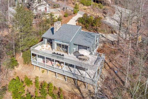 an aerial view of a house on a hill at Lakeside Serenity Mnt Views Decks Foosball in Lake Lure