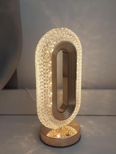 a light up sculpture of a letter o on a table at KLIA Travel Homestay - 3R 2B - WIFI & NETFLIX in Sepang