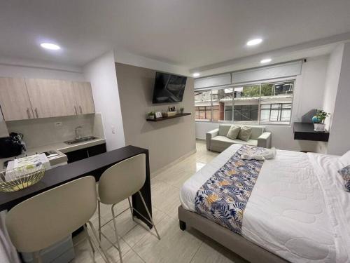 Postel nebo postele na pokoji v ubytování Castellana 202 - Apartaestudio loft en la Castellana Norte