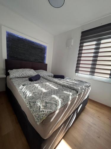 Postel nebo postele na pokoji v ubytování CASA BOX APARTMENT Free garage