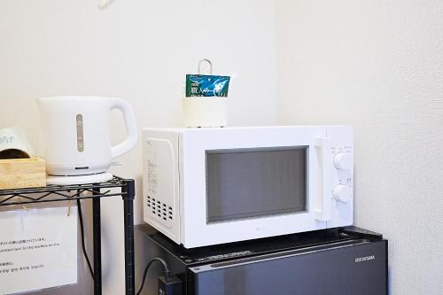 ロワジール岩槻301にあるキッチンまたは簡易キッチン