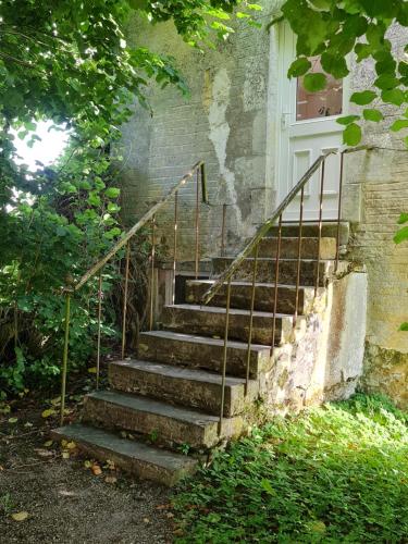 Κήπος έξω από το Chambres d'hôtes de la Grande Maison
