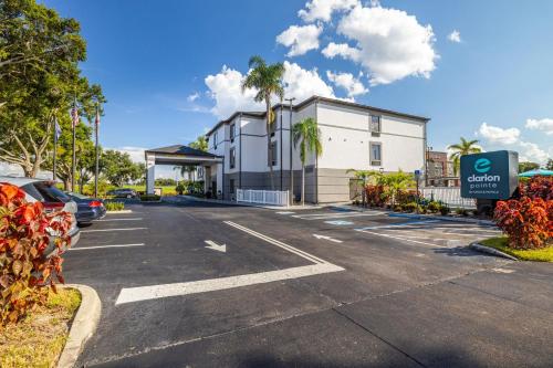 a parking lot in front of a building at Clarion Pointe Lakeland I-4 in Lakeland
