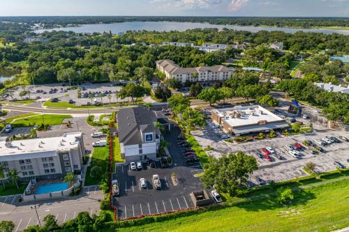 an aerial view of a building with a parking lot at Clarion Pointe Lakeland I-4 in Lakeland