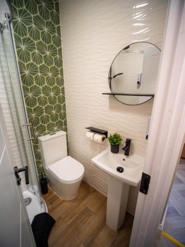 Ένα μπάνιο στο Apart Hotel Rugby -Self Check In-