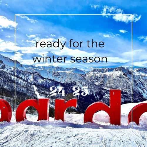a sign that reads ready for the winter season at HOTEL LA NIGRITELLA in Bardonecchia