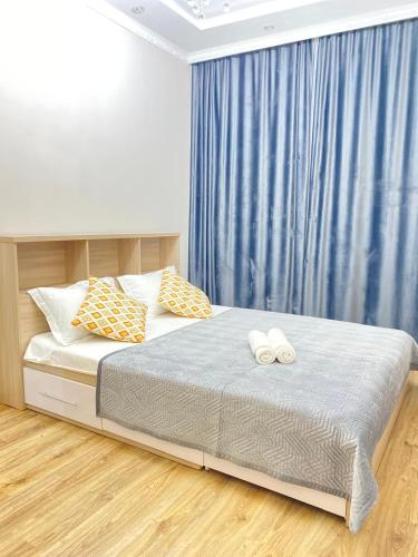 Llit o llits en una habitació de Экспо-6 двушка