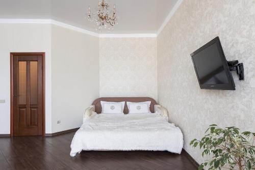 Posteľ alebo postele v izbe v ubytovaní Kvartira v Arkadii
