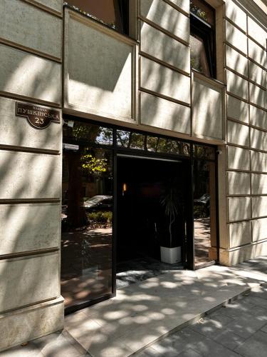 a entrance to a building with a large doorway at Apartments Black Sea in Odesa