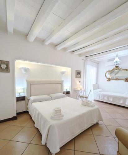 A bed or beds in a room at Setes - Appartamento in centro