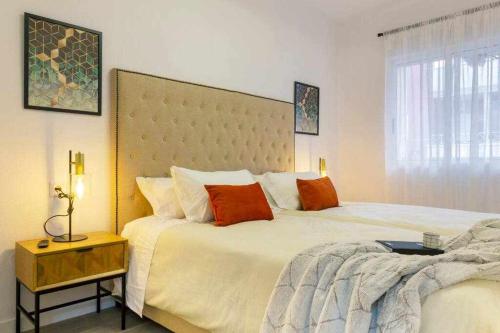 Posteľ alebo postele v izbe v ubytovaní Apartamento Pink Puerto