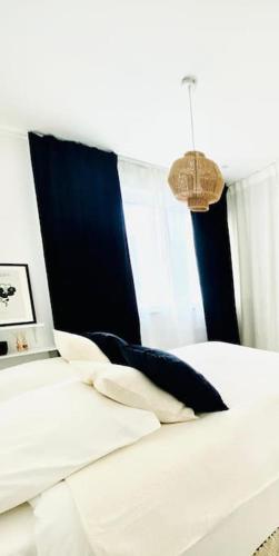 Postel nebo postele na pokoji v ubytování Le Prévert Design