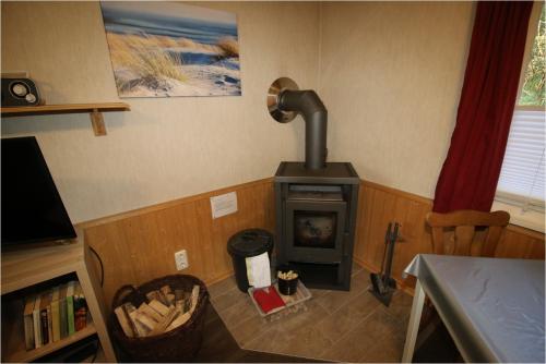 Fotografie z fotogalerie ubytování Bungalow RUHE UND STURM direkt am STRAND mit KAMIN nur für ERWACHSENE v destinaci Nonnevitz