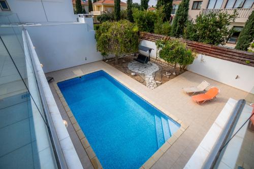 an overhead view of a swimming pool on top of a building at Beachfront Villa Larnaka Dhekelia with Pool in Pyla