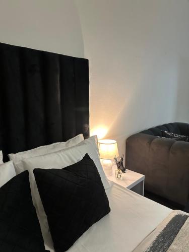 Ένα ή περισσότερα κρεβάτια σε δωμάτιο στο Stylish Apartment