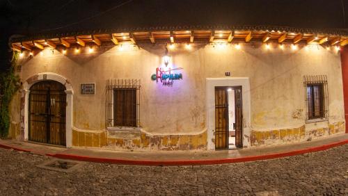 a building with a sign on the side of it at Hot Chipilin in Antigua Guatemala