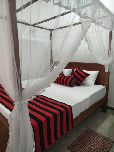 Postel nebo postele na pokoji v ubytování 17 Cinnamon Villa Ahangama