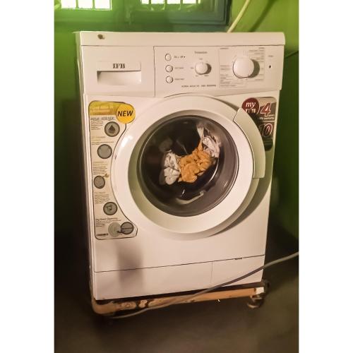 a washing machine with food inside of it at Sai Baba homestay in Kanchipuram