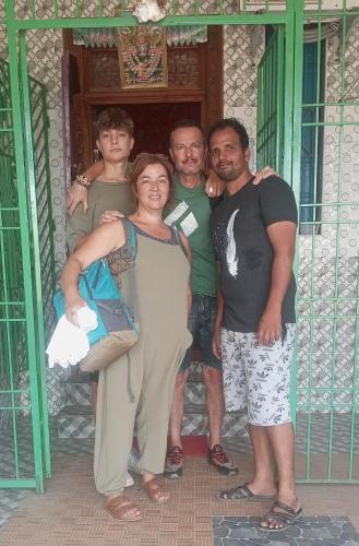 a group of people standing in front of a building at Sai Baba homestay in Kanchipuram