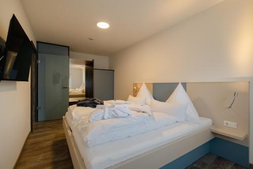 Katil atau katil-katil dalam bilik di Südseequartier - Lausitzer Seenland