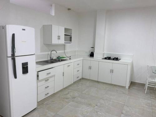 Cucina o angolo cottura di Lindo Apartamento Moderno PISO 3 Apartamento # 14