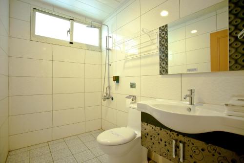 Un baño de Mang Yi Zhan Inn