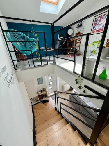 a view of a staircase in a house at Charmant appartement à Roanne in Roanne