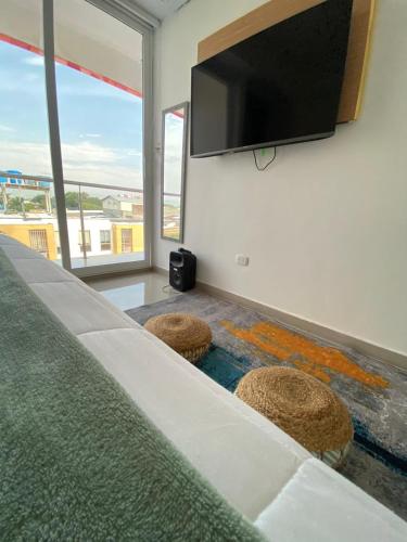 TV a/nebo společenská místnost v ubytování Edificio Limonatta