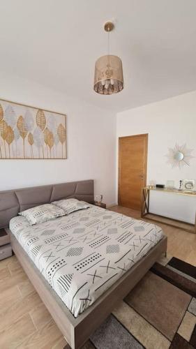 a bedroom with a large bed in a room at Villa Romana Monastir in Monastir