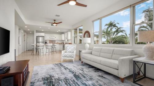 a living room with a couch and a table at Na Hale H2 in Kailua-Kona