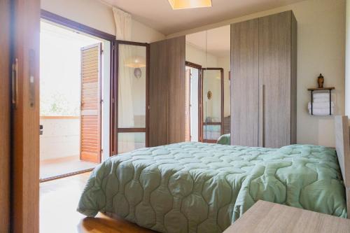 Postel nebo postele na pokoji v ubytování La casa di Tilde