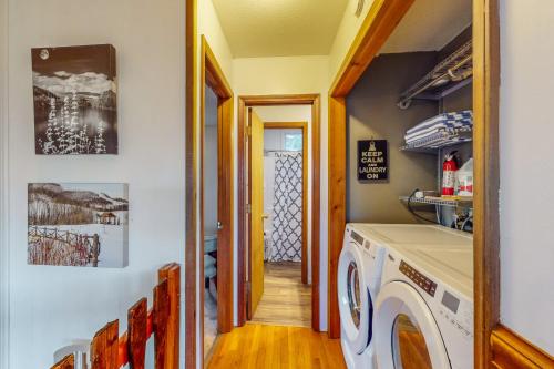 a laundry room with a washer and dryer at Highland Haven in Newland