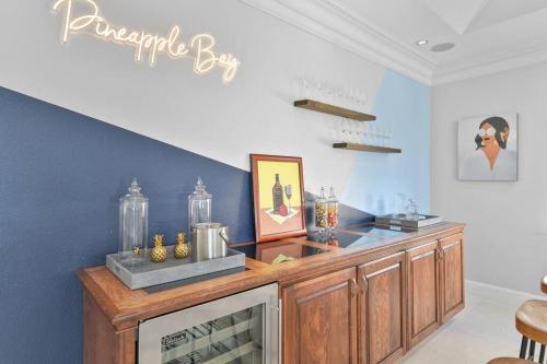 a living room with a large wooden counter top at Bayfront Luxury House with Pool in Kemah
