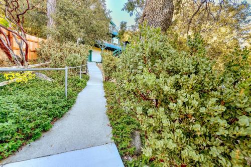 a walking path in front of a house at Spacious Idyllwild Home with Mountain Views! in Idyllwild