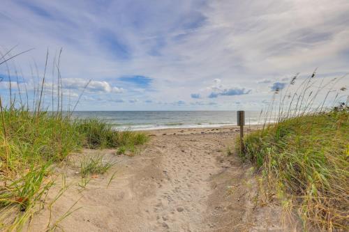 a sandy beach with the ocean in the background at Oceanside Beachfront Fort Pierce Retreat in Fort Pierce