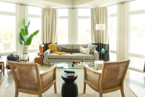 a living room with a couch and chairs at Downtown, contemporary, 2 bedroom, Roof Terrace! 2B in Savannah