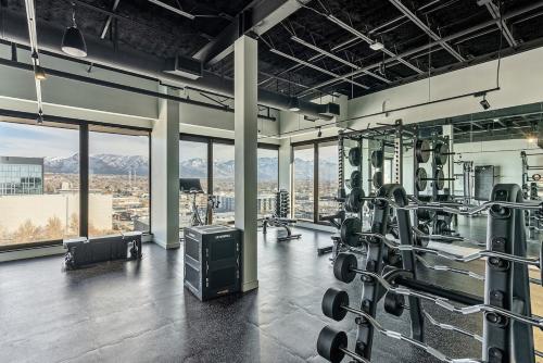 a gym with a view of the mountains at Central Studio Apt - 65 TV - Gym - Parking in Salt Lake City