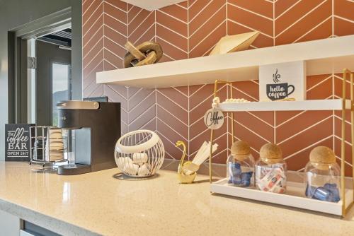a kitchen with a counter top with a coffee maker at Downtown Studio - Gym - Parking - PetsOK in Salt Lake City