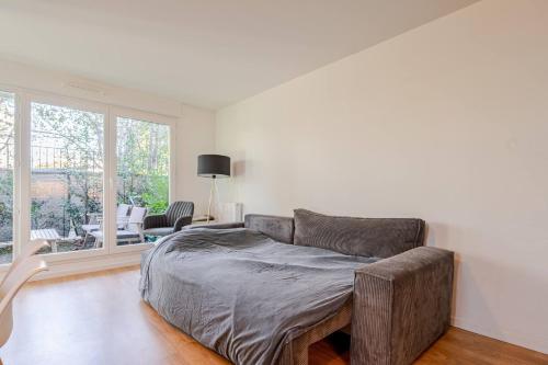 Χώρος καθιστικού στο l'Éden familial - cosy T3 proche Disneyland avec jardin