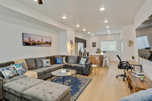 a living room with a couch and a table at Spacious townhouse - Mins to Downtown SLC - Garage in Salt Lake City