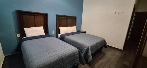 Hotel Cantera Jaguarにあるベッド