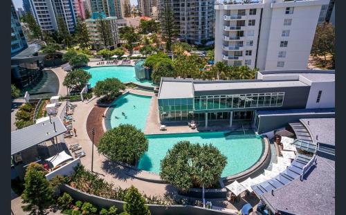 an overhead view of a large swimming pool in a city at Q Tower Apartments - Hosted by Wow Stay in Gold Coast
