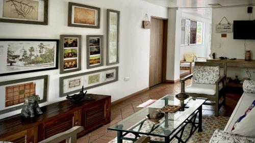 a living room with a couch and a coffee table at Apolonia Boutique in Guaduas