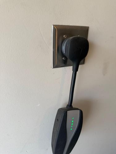 a black spatula hanging from a wall at 3 bedroom with pool in Reynosa