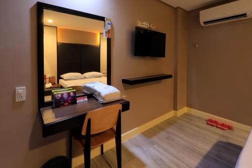 TV a/nebo společenská místnost v ubytování Hotel Sogo Fairview